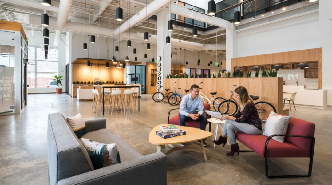 modern office lounge with people and bicycles