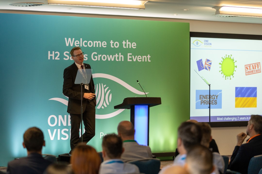 man giving presentation at business growth event