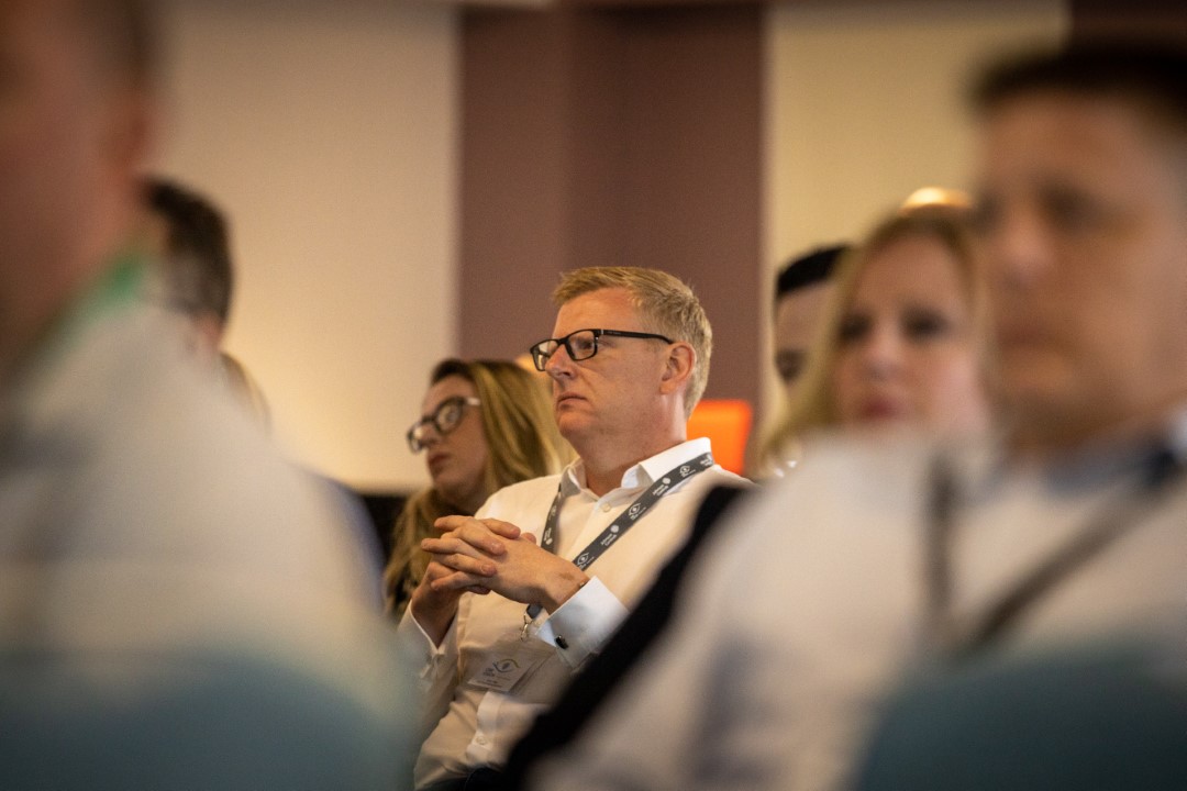 people listening attentively at a conference or seminar