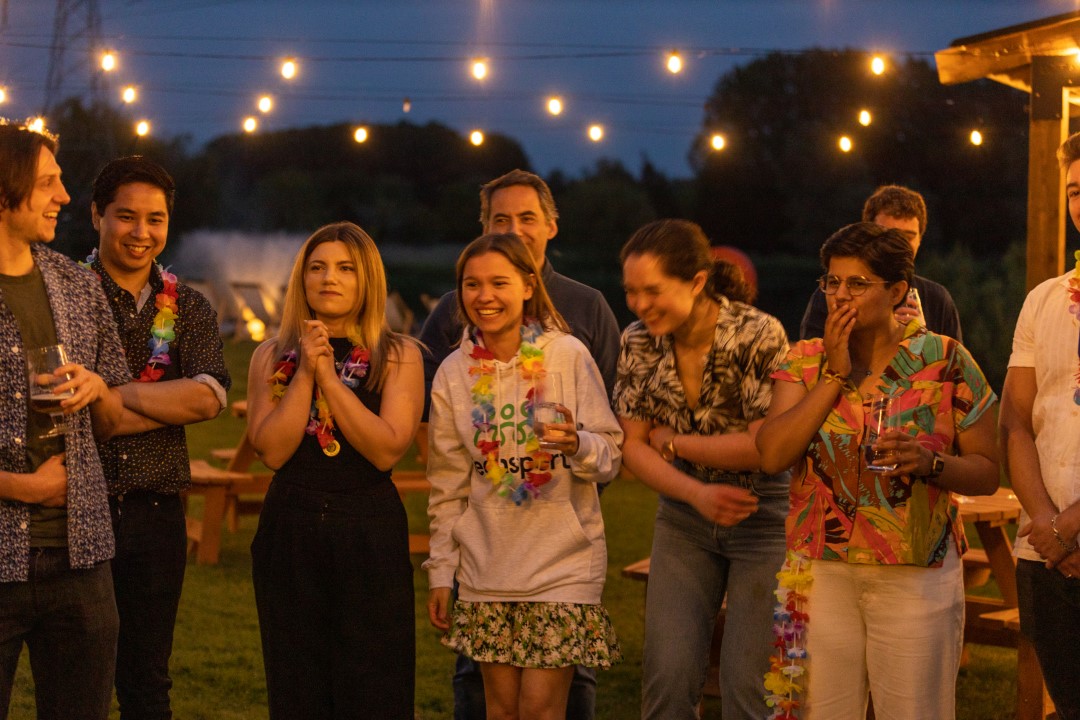 group of friends enjoying outdoor night party