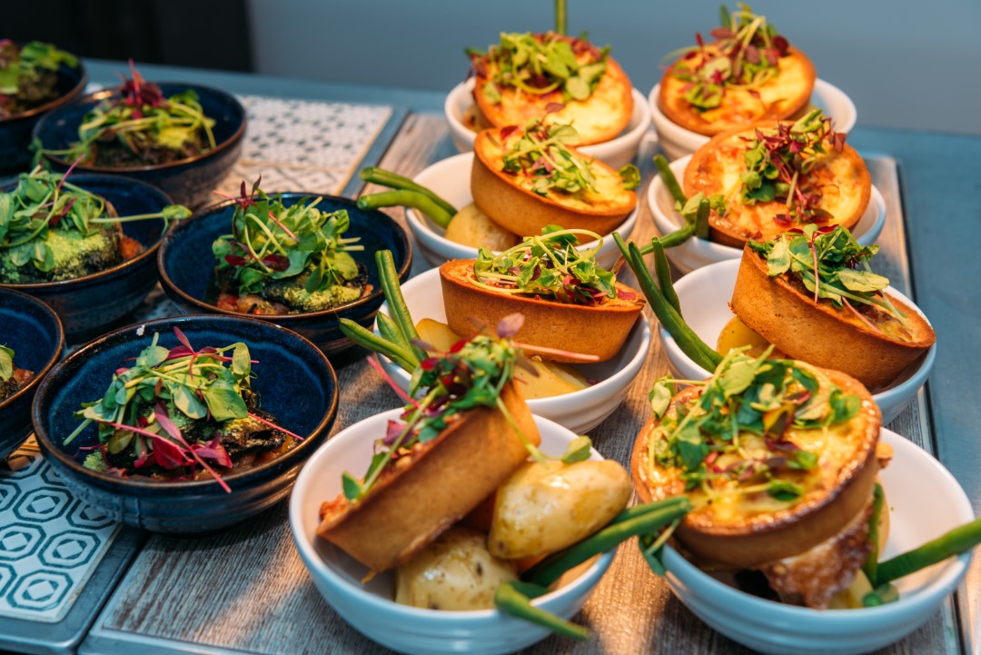 mini pies with green beans and new potatoes in bowls