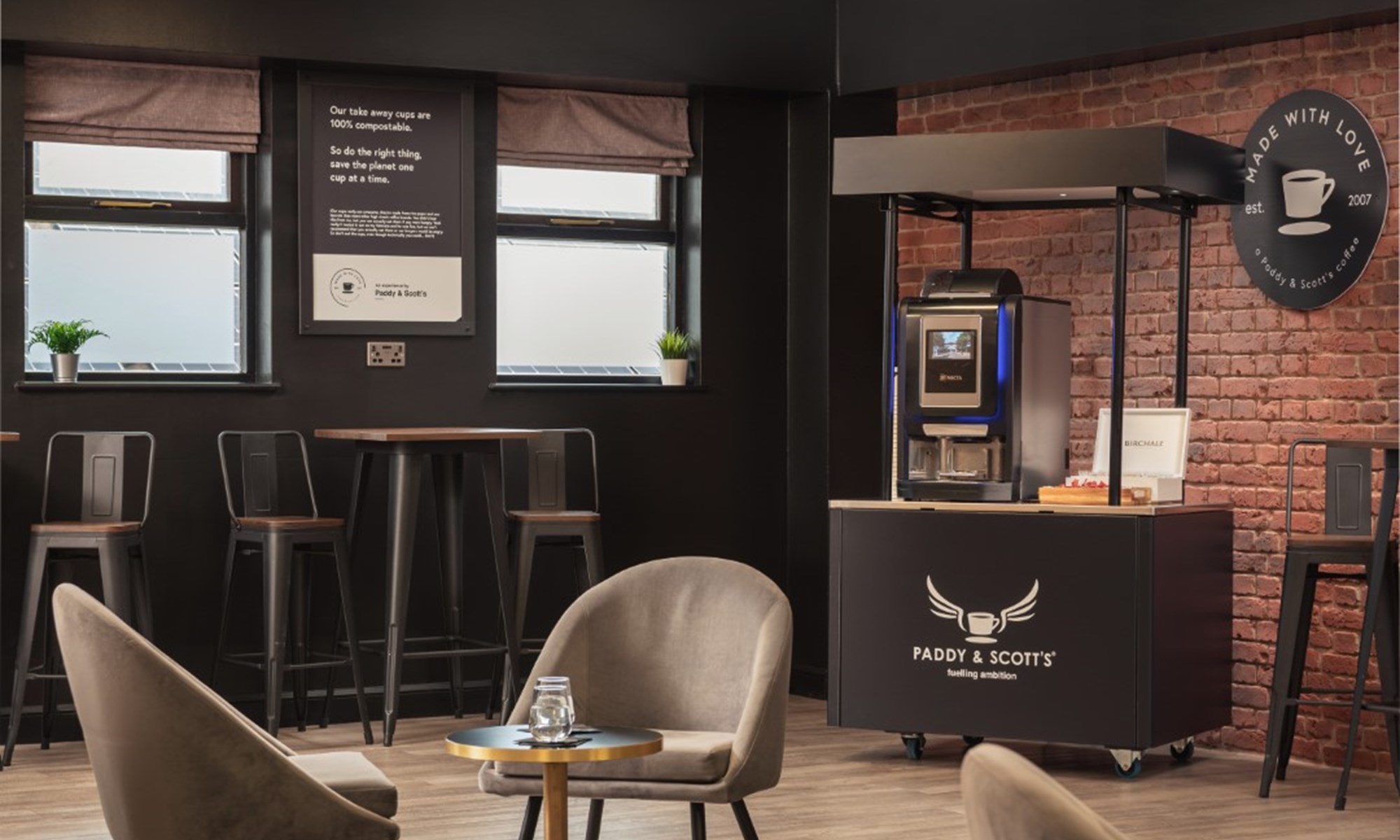 modern cafe seating area with coffee machine and stools