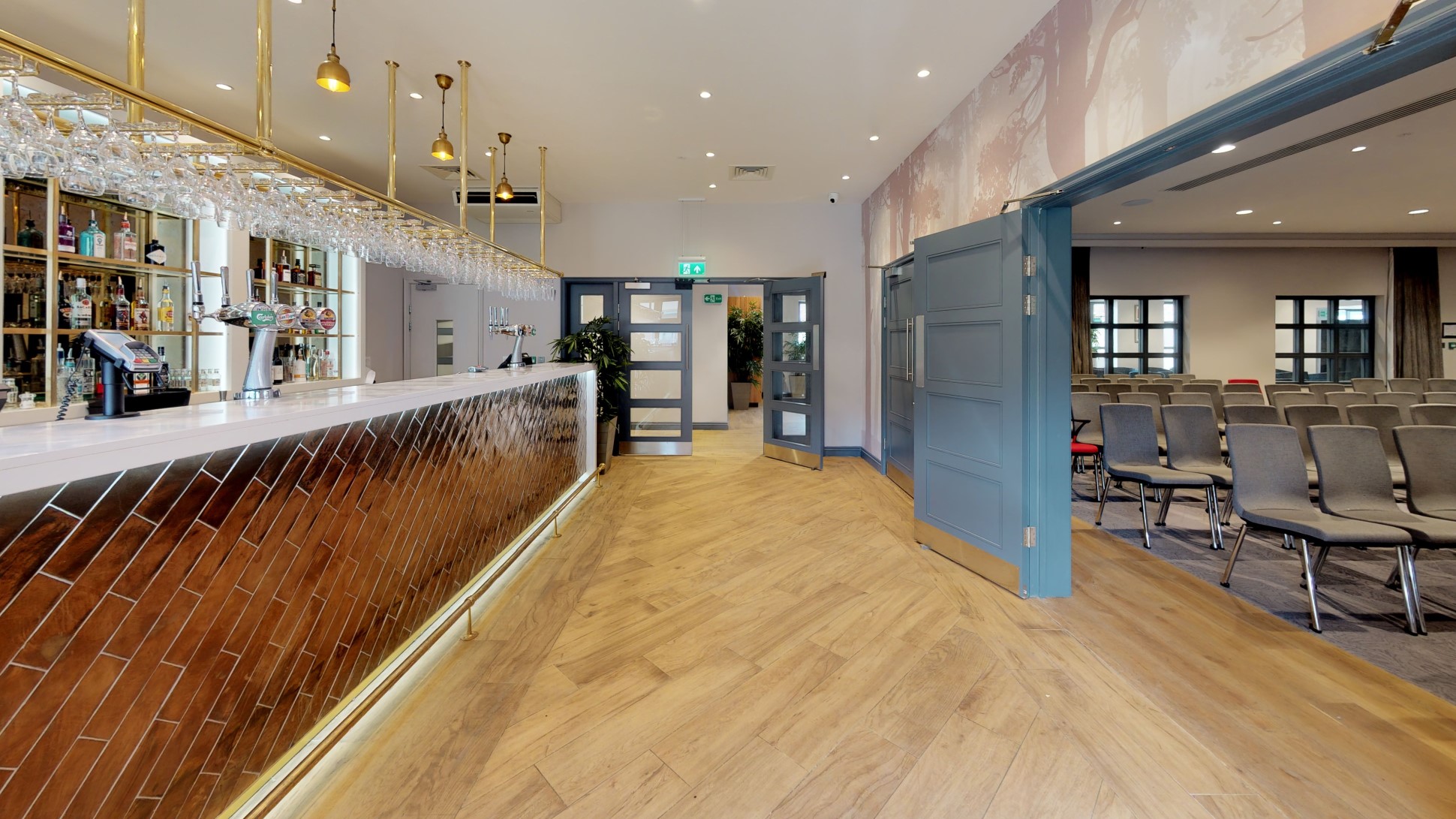 empty bar area with chairs and open doorway
