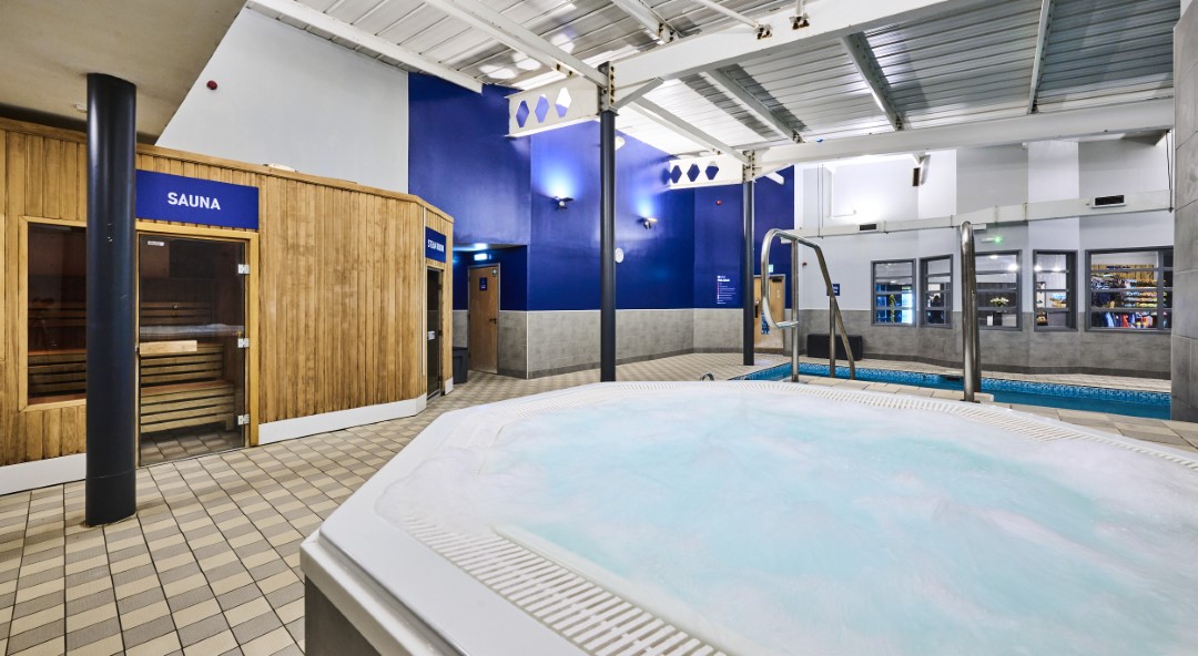 indoor spa area with jacuzzi sauna and pool