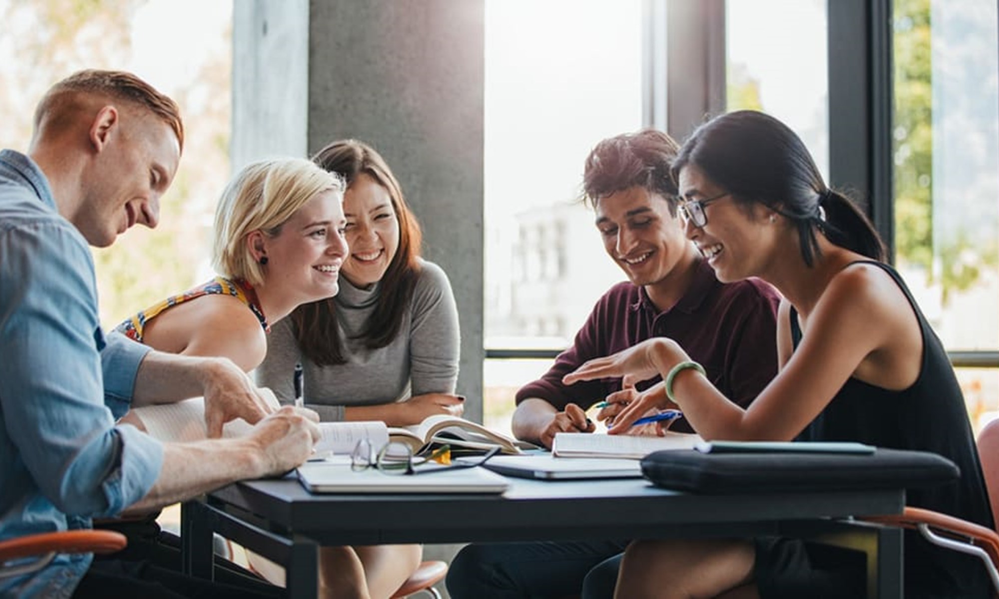 Smiling Students Collaborate High School College Feature Image