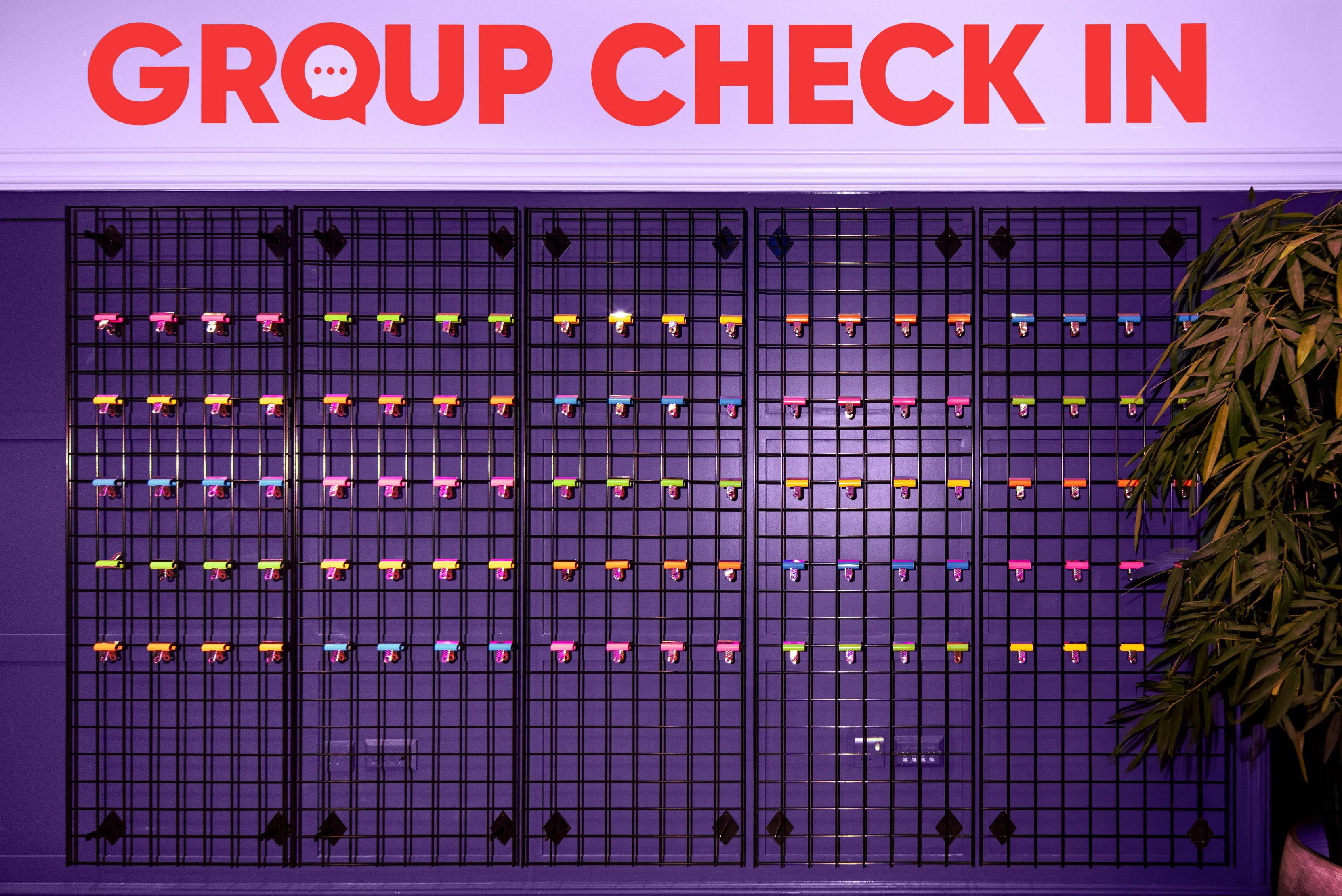 colourful key tags on grid display under group check in